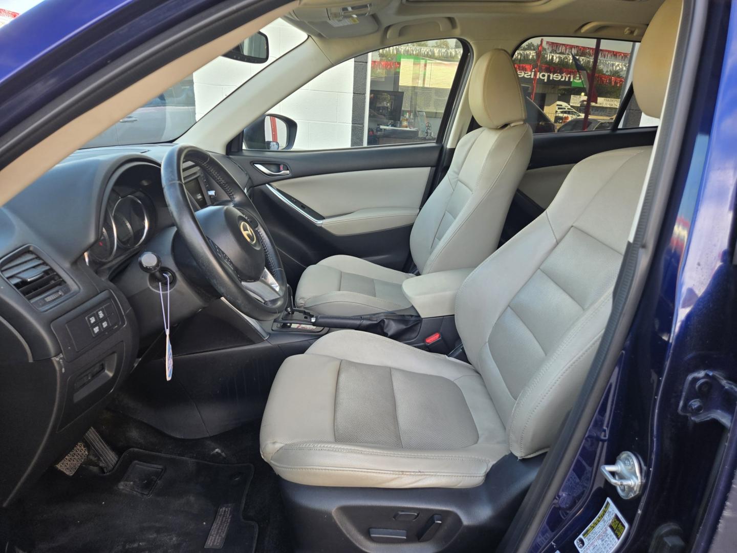 2013 BLUE Mazda CX-5 Grand Touring (JM3KE2DE8D0) with an 2.0L l4 F DOHC 16V engine, 6A transmission, located at 503 West Court, Seguin, TX, 78155, (830) 379-3373, 29.568621, -97.969803 - 2013 Mazda CX-5 Grand Touring with a 2.0L l4 F DOHC 16V, Automatic, Tilt, Cruise, AM/FM/CD Touchscreen Stereo, Power Windows, Locks, Seats and Side Mirrors, Leather Seating, Bluetooth, Dual Climate Control, Power Sunroof, Tinted Windows, Alloy Wheels, Rear Wiper, Rear Defroster and more!!- Photo#4